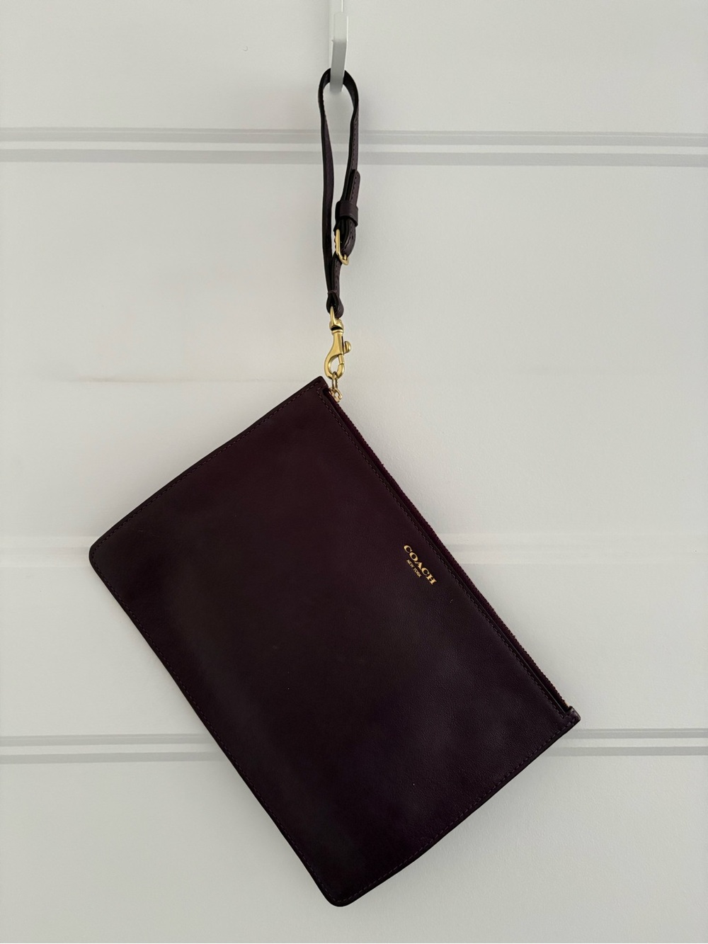 Coach Leather Wristlet in Plum with Gold Hardware